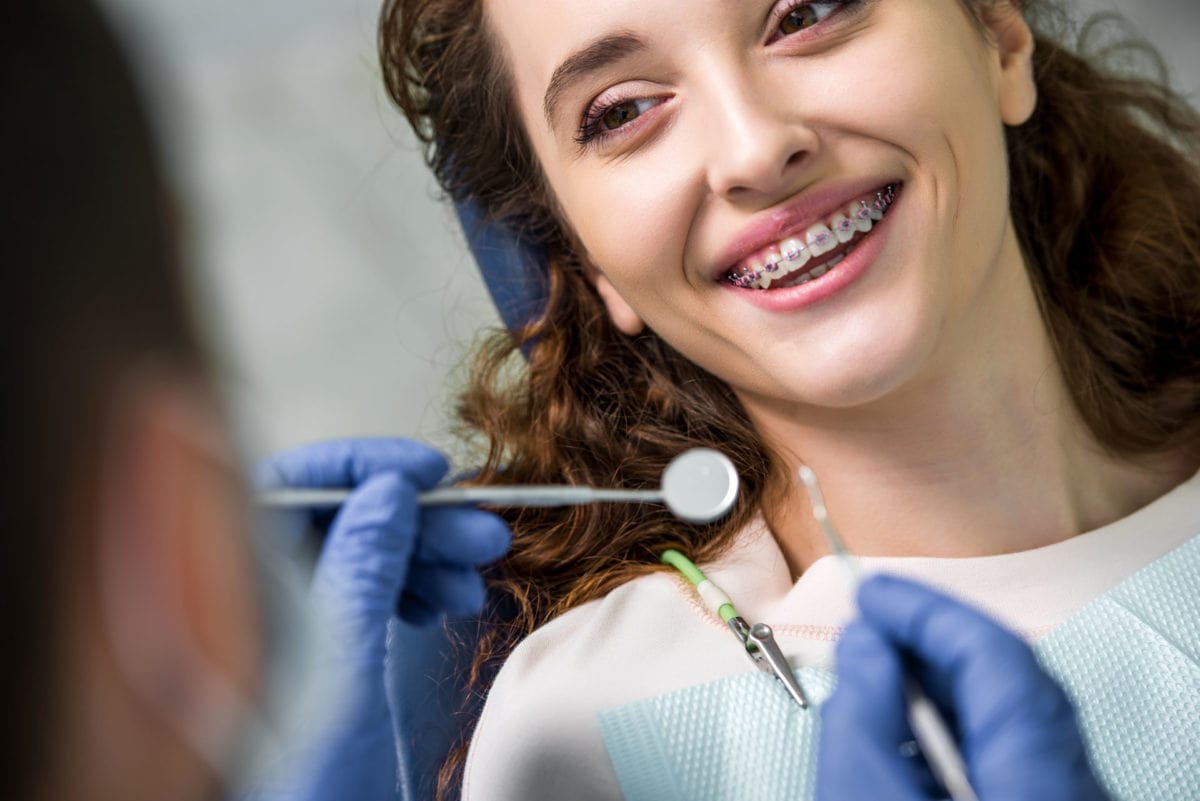 long-beach-braces orthodontist with patient